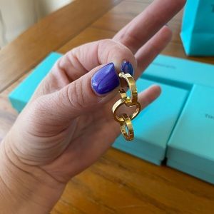 Tiffany and Co gold interlocking hoop earrings